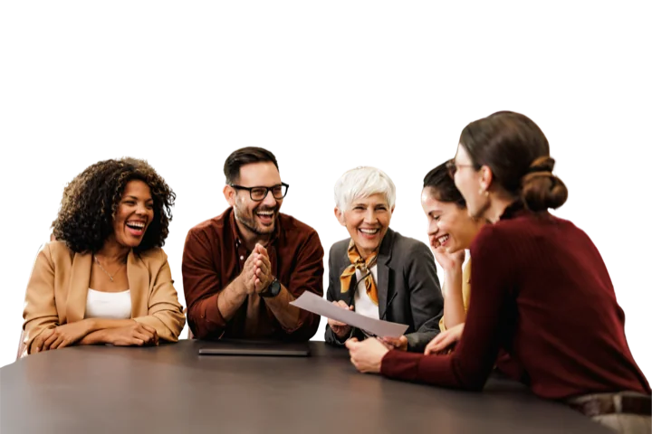 Colleagues sharing a conversation around a table